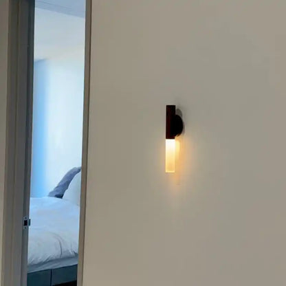 Rechargeable sensor wall light — mounted outside a bedroom doorway