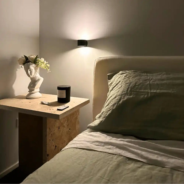 LED Rechargeable Wall Light/Sconce by a bed